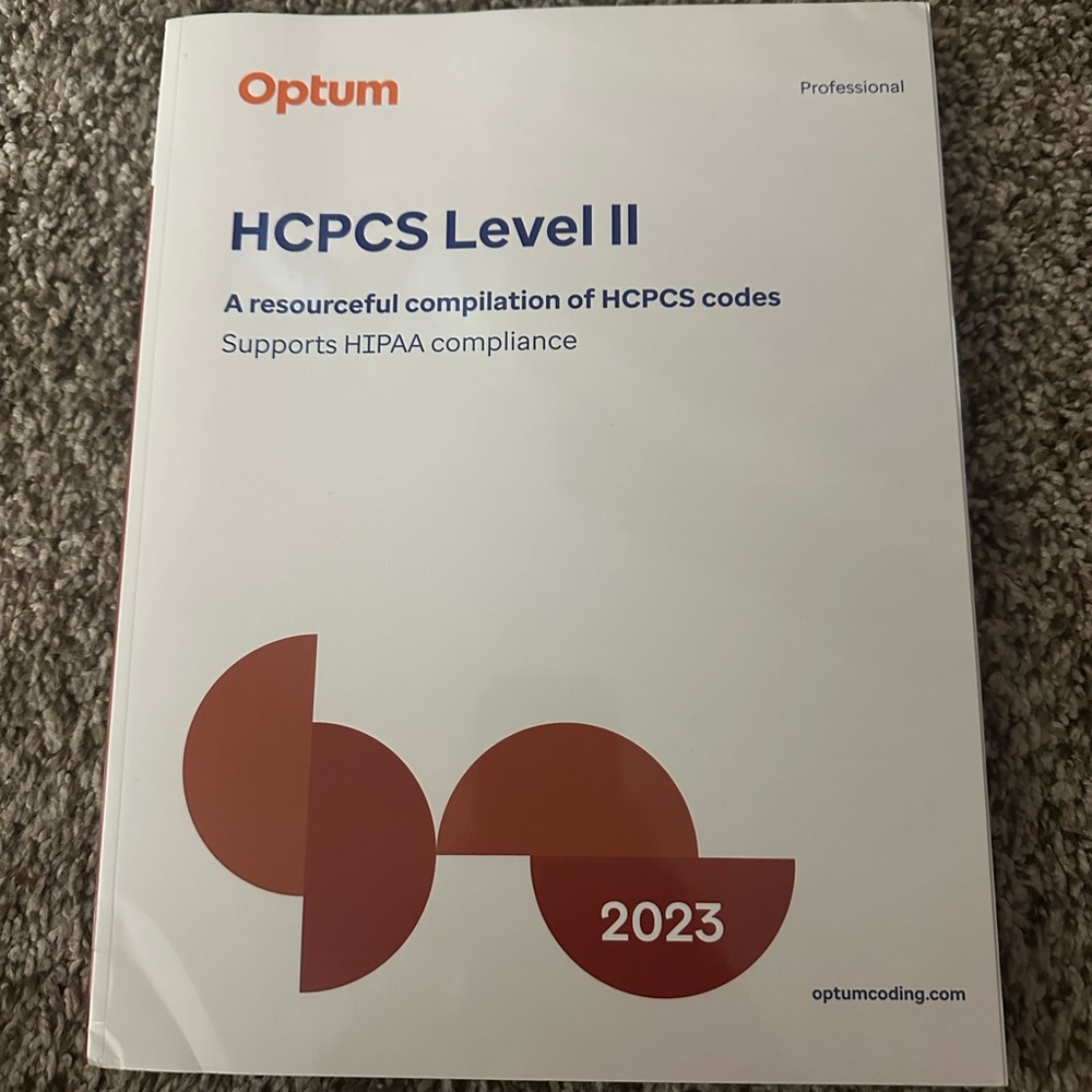Optum HCPCS Level II 2023 Coding Manual - White with Rust Accents